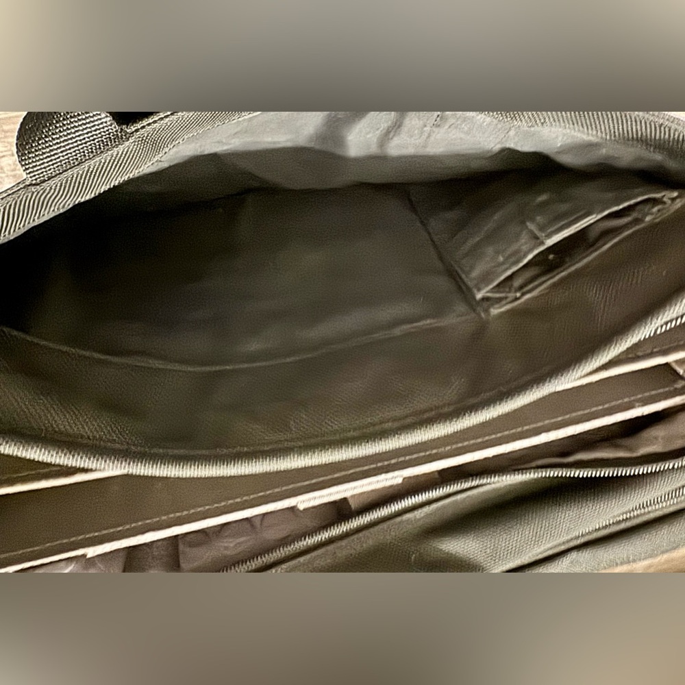 TUMI black laptop carrier bag. It has wallet inside.  It has various - Picture 9 of 15